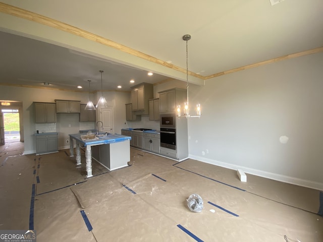 179 Merwood Ln Unit 125, Jefferson, GA 30549 - kitchen featuring oven, gray cabinetry, recessed lighting, stovetop, and a center island with sink