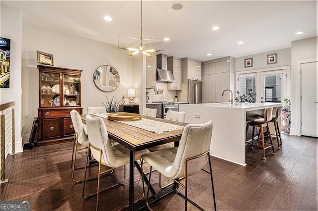 710 Oakview Rd, Decatur, GA 30030 - dining area with a chandelier, dark wood-style floors, and recessed lighting