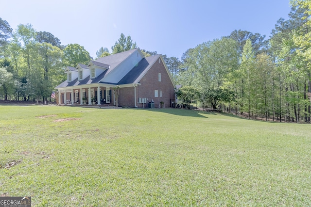 11389 Whitesville Rd, Fortson, GA 31808 - view of front of property with brick siding and a front lawn