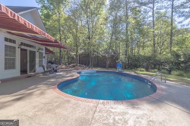 11389 Whitesville Rd, Fortson, GA 31808 - swimming pool featuring french doors and a patio area