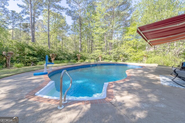 11389 Whitesville Rd, Fortson, GA 31808 - swimming pool with a patio area