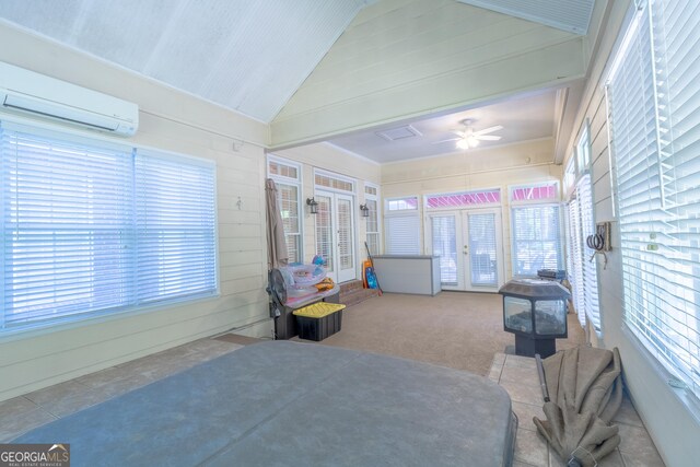 11389 Whitesville Rd, Fortson, GA 31808 - sunroom / solarium featuring french doors, an AC wall unit, healthy amount of natural light, and vaulted ceiling