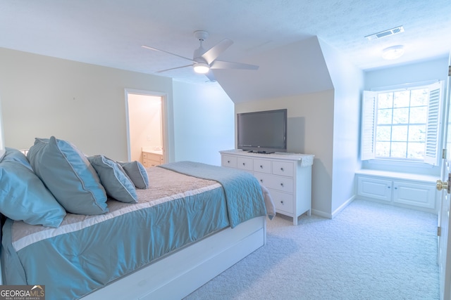 11389 Whitesville Rd, Fortson, GA 31808 - bedroom with light colored carpet, ensuite bathroom, a ceiling fan, and baseboards