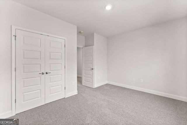 321 Magnolia Villas Dr, Cornelia, GA 30531 - unfurnished bedroom featuring carpet, baseboards, a closet, and recessed lighting