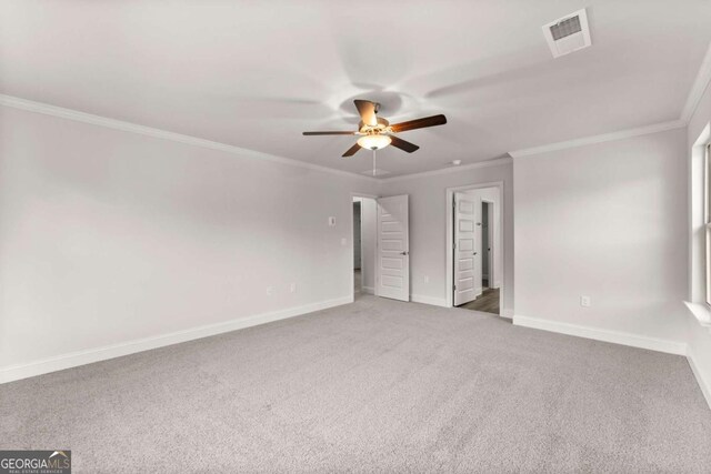 321 Magnolia Villas Dr, Cornelia, GA 30531 - unfurnished bedroom featuring ornamental molding, carpet, baseboards, and a ceiling fan