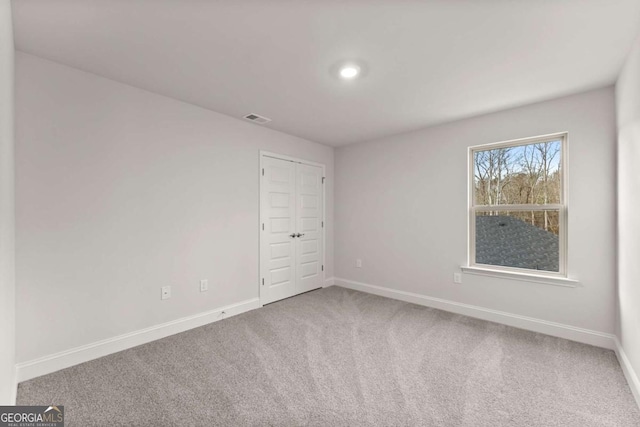 321 Magnolia Villas Dr, Cornelia, GA 30531 - spare room featuring baseboards and carpet floors