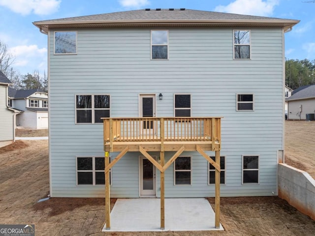 321 Magnolia Villas Dr, Cornelia, GA 30531 - rear view of house with a patio, central AC, and a wooden deck