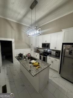 44 Lee St, Concord, GA 30206 - kitchen with appliances with stainless steel finishes, white cabinets, pendant lighting, stone countertops, and a center island