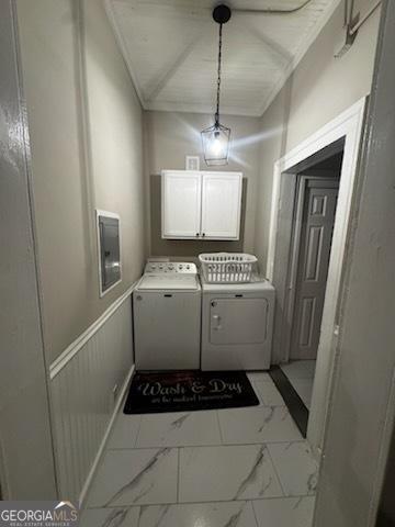 44 Lee St, Concord, GA 30206 - laundry area with cabinet space, light marble finish floors, washing machine and dryer, and electric panel