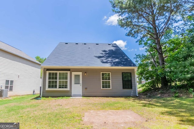 4695 Ravenwood Loop, Union City, GA 30291 - back of house with a lawn and cooling unit