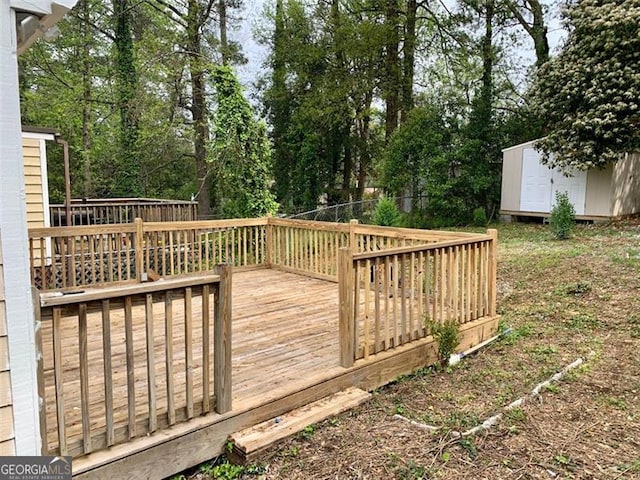 4347 Barrington Pl, Macon, GA 31210 - wooden deck featuring view of wooded area