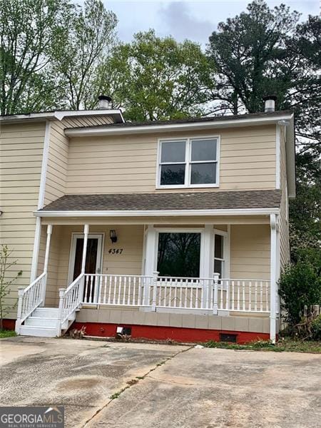 4347 Barrington Pl, Macon, GA 31210 - view of front facade featuring a chimney, covered porch, and a shingled roof