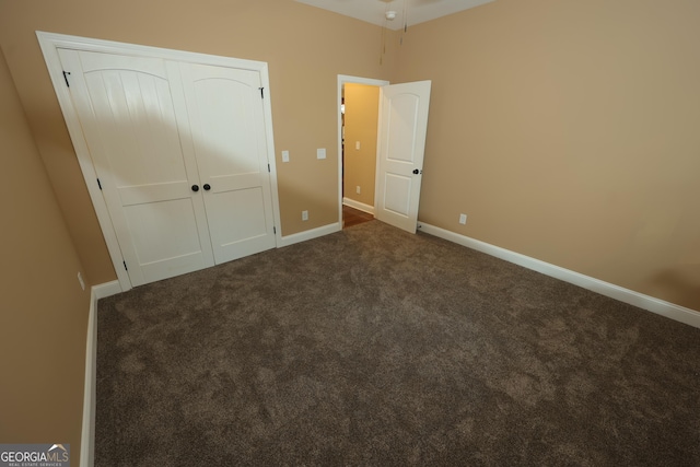 1663 Piedmont Rd, Griffin, GA 30224 - unfurnished bedroom with carpet floors, baseboards, and a closet