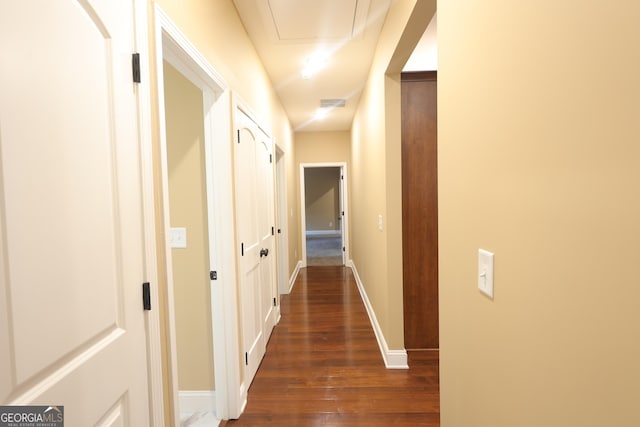 1663 Piedmont Rd, Griffin, GA 30224 - corridor featuring dark wood finished floors and baseboards