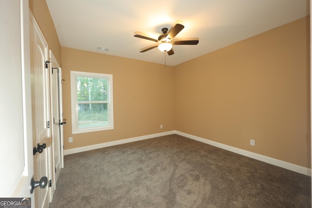 1663 Piedmont Rd, Griffin, GA 30224 - unfurnished room featuring ceiling fan, carpet, and baseboards