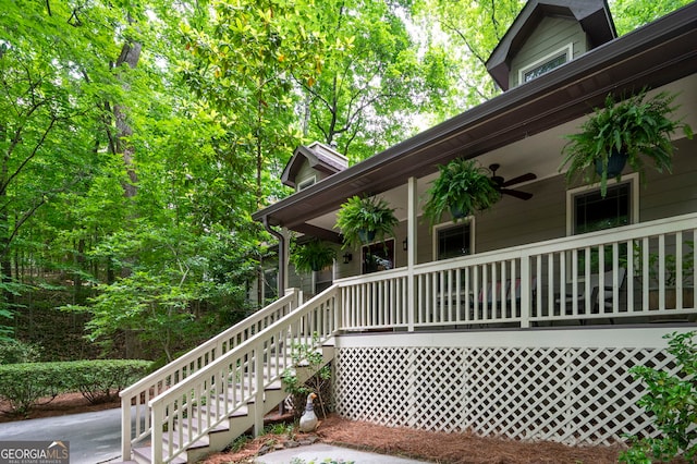 1560 Bubbling Creek Rd NE, Atlanta, GA 30319 - view of side of property featuring covered porch, a ceiling fan, and stairway