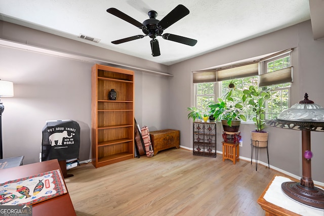1560 Bubbling Creek Rd NE, Atlanta, GA 30319 - office with wood finished floors, ceiling fan, and baseboards