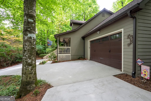 1560 Bubbling Creek Rd NE, Atlanta, GA 30319 - view of home's exterior with driveway and a garage