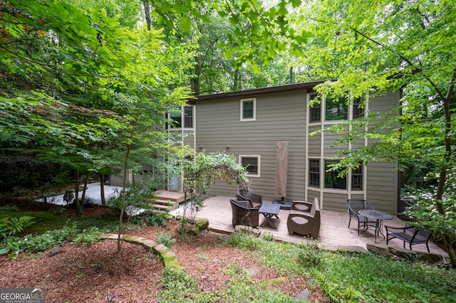 1560 Bubbling Creek Rd NE, Atlanta, GA 30319 - rear view of property with a deck