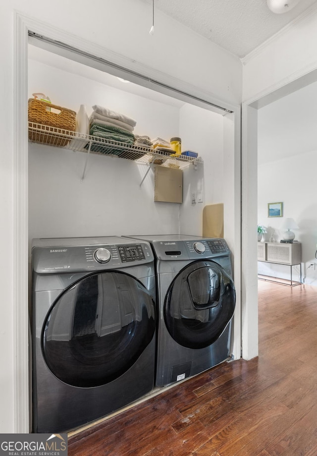 1682 Grace St SE, Atlanta, GA 30316 - laundry room with independent washer and dryer and wood finished floors