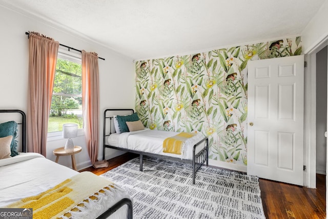 1682 Grace St SE, Atlanta, GA 30316 - bedroom with wood finished floors, baseboards, and crown molding
