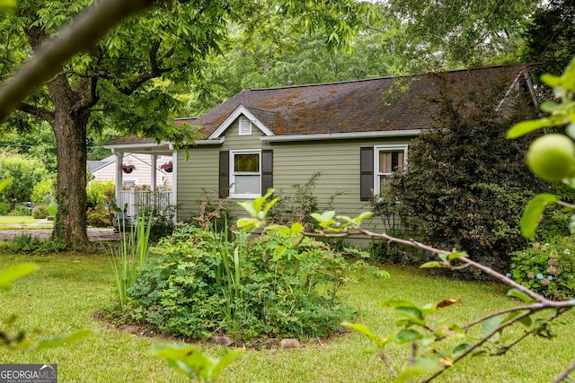 1682 Grace St SE, Atlanta, GA 30316 - view of property exterior featuring a yard