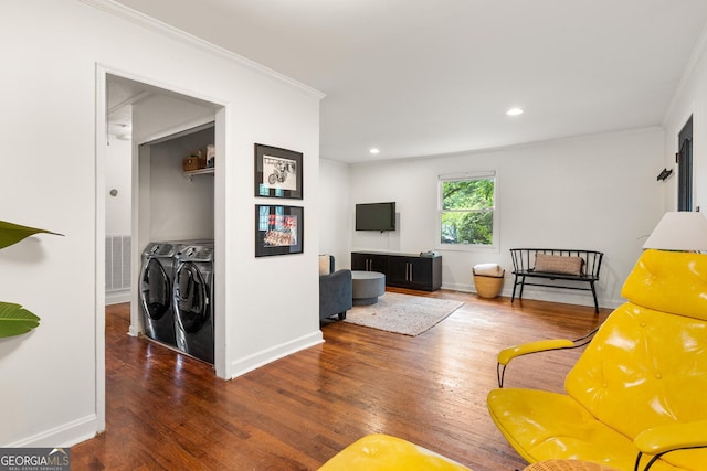 1682 Grace St SE, Atlanta, GA 30316 - living room featuring independent washer and dryer, ornamental molding, wood finished floors, baseboards, and recessed lighting
