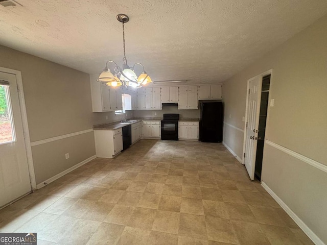 6668 Prinston Cir, Douglasville, GA 30135 - kitchen featuring black appliances, a chandelier, white cabinets, a textured ceiling, and hanging light fixtures
