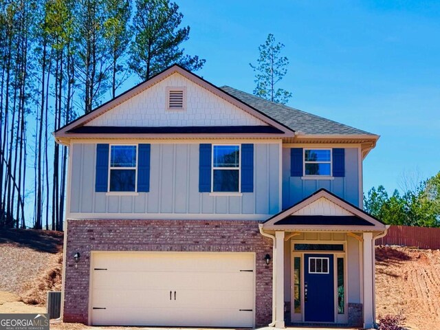 635 Forest Way, Cornelia, GA 30531 - view of front of property with an attached garage, brick siding, board and batten siding, and driveway