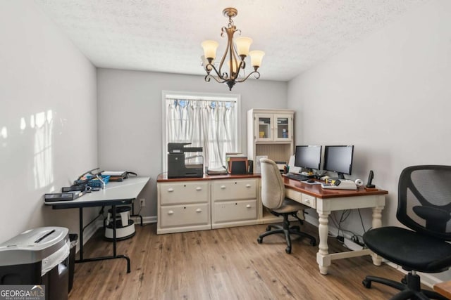 397 Harvey Lokey Rd, Bethlehem, GA 30620 - office space with a chandelier, a textured ceiling, and wood finished floors