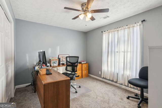 397 Harvey Lokey Rd, Bethlehem, GA 30620 - carpeted home office featuring ceiling fan and a textured ceiling