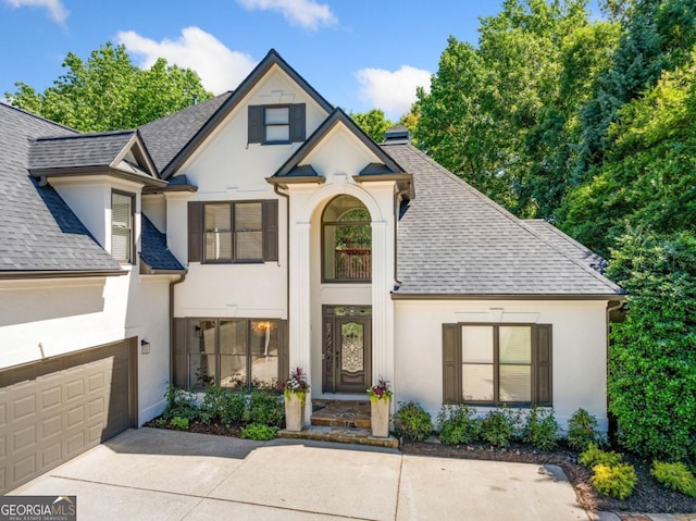 414 Dogwood Way, Canton, GA 30114 - french country style house featuring stucco siding and roof with shingles
