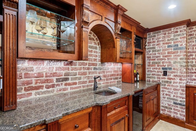 414 Dogwood Way, Canton, GA 30114 - kitchen featuring a sink, brown cabinetry, stone countertops, black dishwasher, and glass insert cabinets