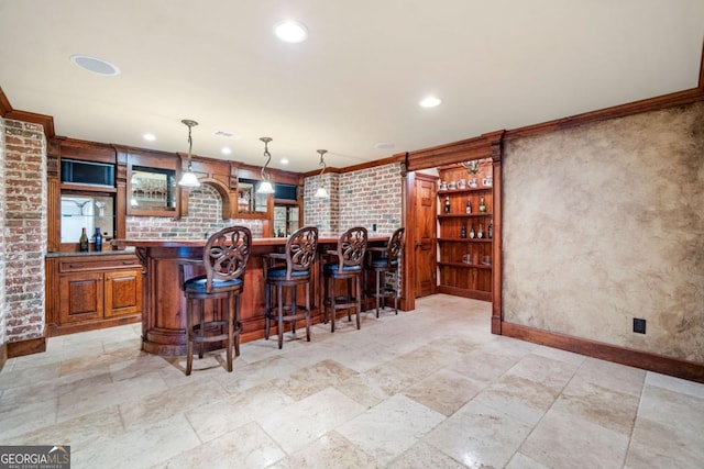 414 Dogwood Way, Canton, GA 30114 - indoor bar with recessed lighting, stone tile flooring, crown molding, pendant lighting, and baseboards
