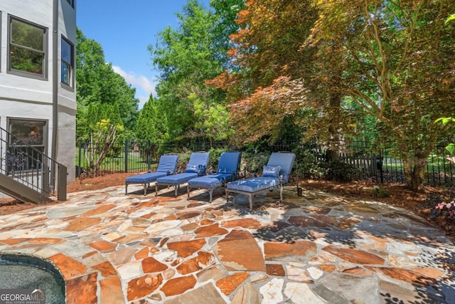 414 Dogwood Way, Canton, GA 30114 - fenced backyard with a patio area