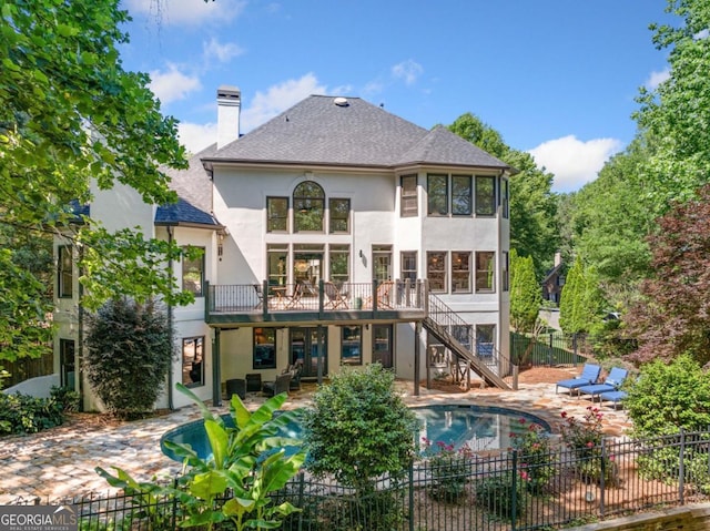414 Dogwood Way, Canton, GA 30114 - rear view of house featuring stucco siding, a patio area, stairway, a chimney, and a shingled roof
