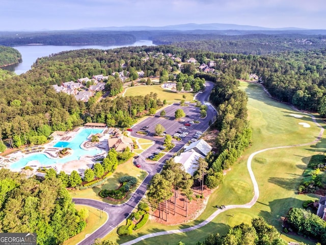 414 Dogwood Way, Canton, GA 30114 - aerial view of property and surrounding area featuring a forest, a large body of water, a pool area, and a local golf course