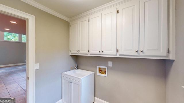 1477 Triple Creek Ct NW, Kennesaw, GA 30144 - laundry room with cabinet space, washer hookup, baseboards, and ornamental molding