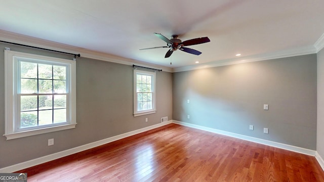 1477 Triple Creek Ct NW, Kennesaw, GA 30144 - unfurnished room with ornamental molding, ceiling fan, baseboards, light wood-type flooring, and recessed lighting
