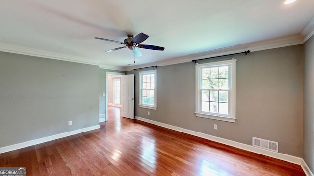 1477 Triple Creek Ct NW, Kennesaw, GA 30144 - unfurnished room featuring baseboards, crown molding, wood finished floors, and ceiling fan
