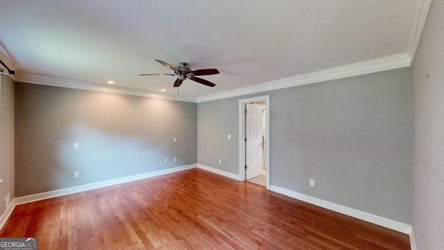 1477 Triple Creek Ct NW, Kennesaw, GA 30144 - spare room with ceiling fan, ornamental molding, light wood-type flooring, baseboards, and recessed lighting
