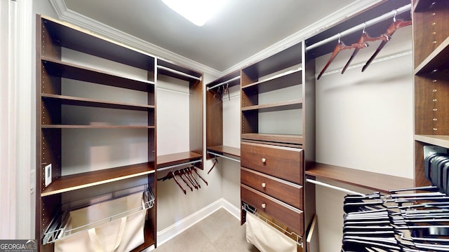 1477 Triple Creek Ct NW, Kennesaw, GA 30144 - walk in closet with light tile patterned floors
