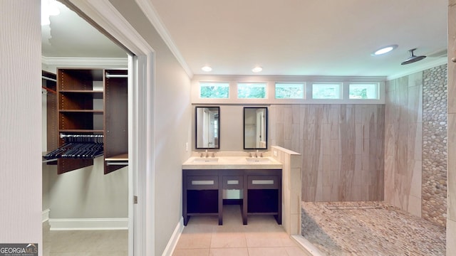 1477 Triple Creek Ct NW, Kennesaw, GA 30144 - bathroom featuring ornamental molding, double vanity, a walk in shower, tile patterned floors, and a spacious closet