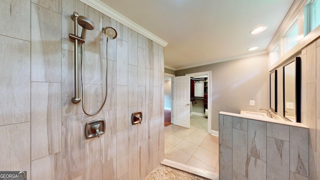 1477 Triple Creek Ct NW, Kennesaw, GA 30144 - bathroom featuring ornamental molding, a tile shower, tile patterned floors, baseboards, and vanity