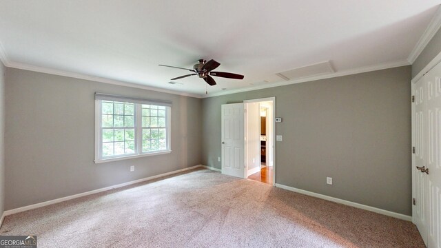 1477 Triple Creek Ct NW, Kennesaw, GA 30144 - unfurnished bedroom with attic access, light carpet, ornamental molding, baseboards, and a ceiling fan