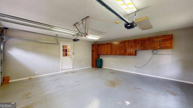 1477 Triple Creek Ct NW, Kennesaw, GA 30144 - garage featuring a garage door opener and baseboards