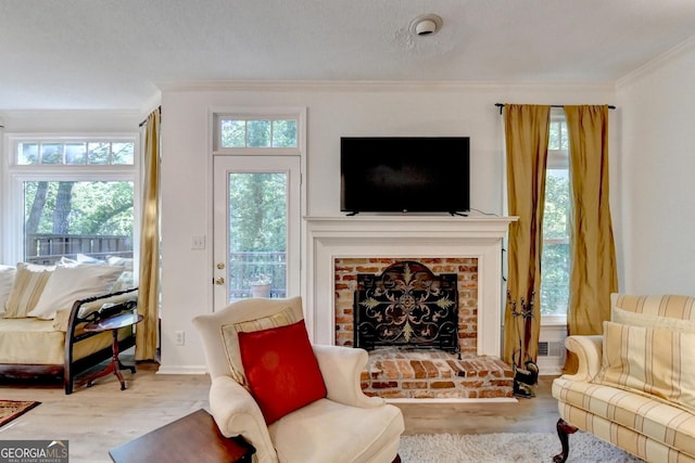 248 Riverview Trl, Roswell, GA 30075 - living room with crown molding, a brick fireplace, and wood finished floors