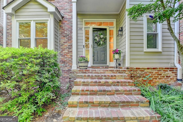 248 Riverview Trl, Roswell, GA 30075 - doorway to property with brick siding