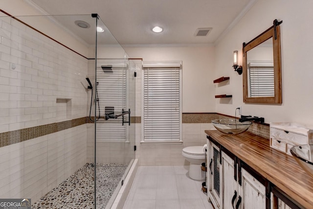 248 Riverview Trl, Roswell, GA 30075 - full bathroom with tile walls, ornamental molding, toilet, a stall shower, and vanity