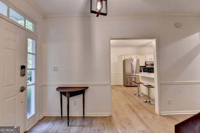 248 Riverview Trl, Roswell, GA 30075 - foyer featuring ornamental molding, light wood-type flooring, and baseboards